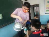 沙河市第五小学在炎炎夏日为学生准备绿豆汤