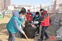 国网唐山供电公司：弘扬雷锋精神 助力社区环境整治