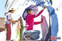 怀来县文联组织美协老师绘制文化墙