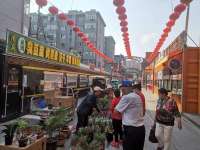 “网红地标”燃起城市“烟火气”便民早市“开进”老火车步行街